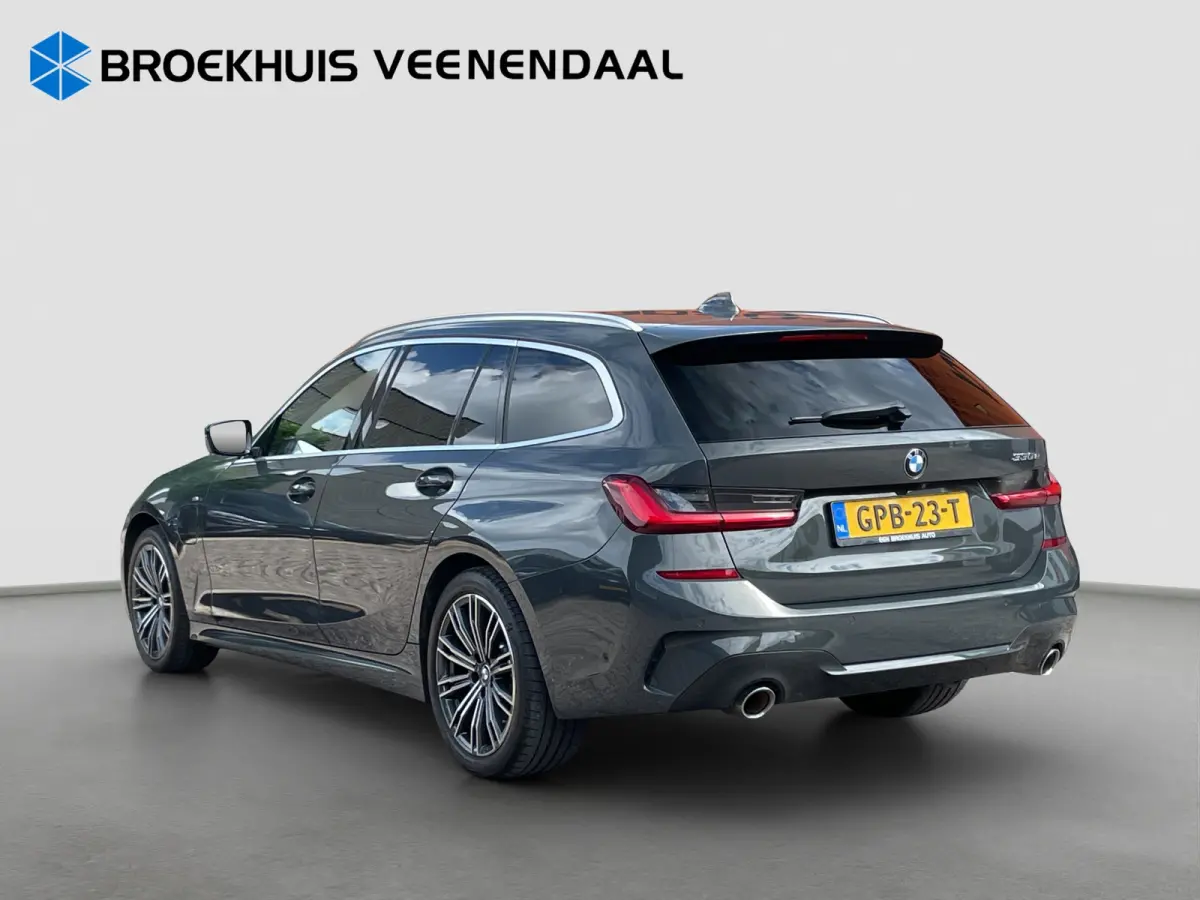 Touring 330e 292pk M-Sport | Pano | Trekhaak | Adap. Cruise | HUD | Stoelverwarming | BLIS |