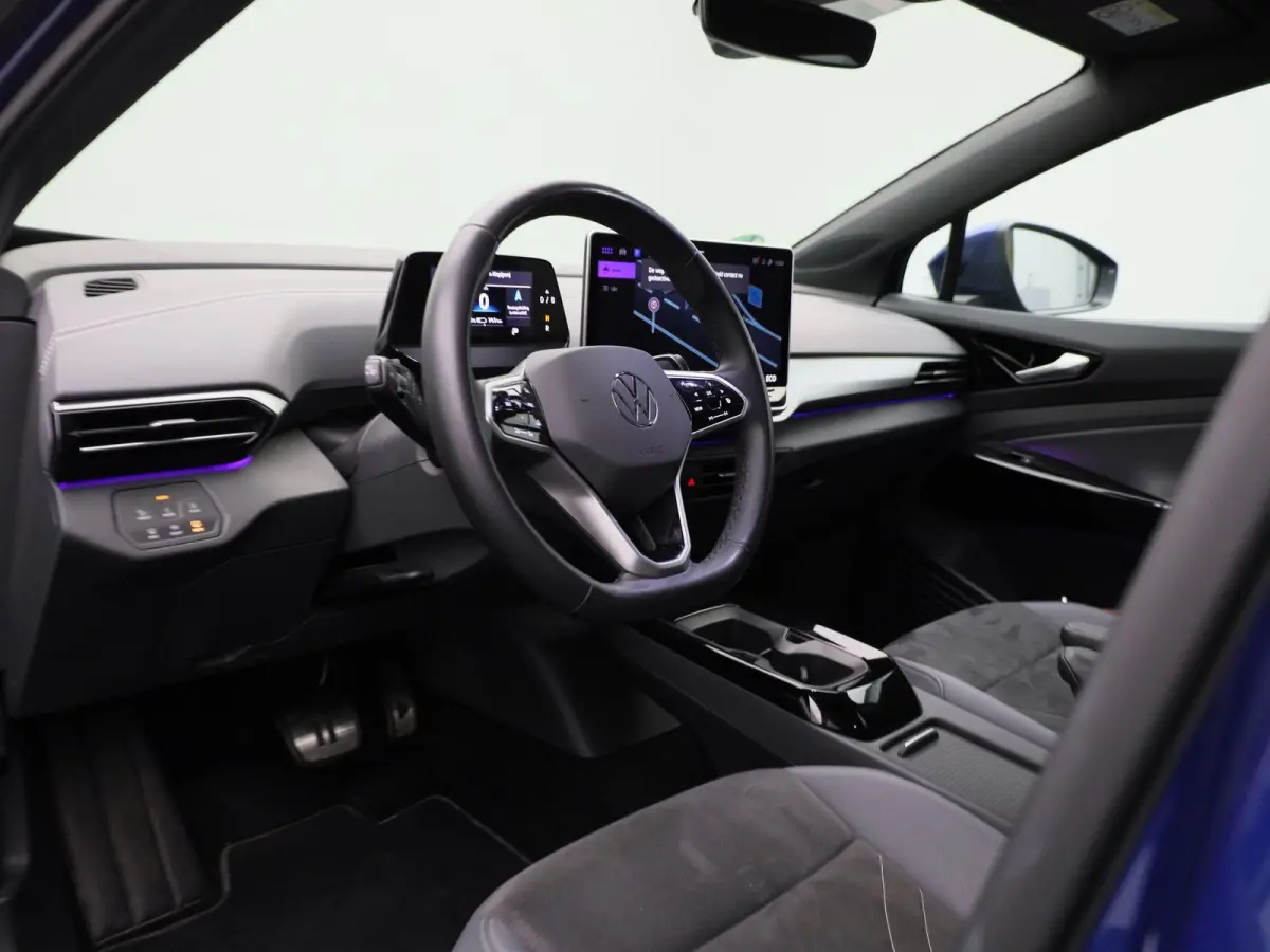 Pro 77 kWh | Navigatie | Apple Carplay | Adaptieve cruise control | Stoelverwarming | Stuur verwarming | Climate control | Parkeersensoren |