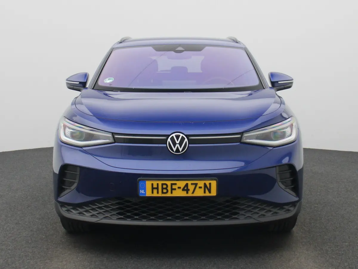Pro 77 kWh | Navigatie | Apple Carplay | Adaptieve cruise control | Stoelverwarming | Stuur verwarming | Climate control | Parkeersensoren |