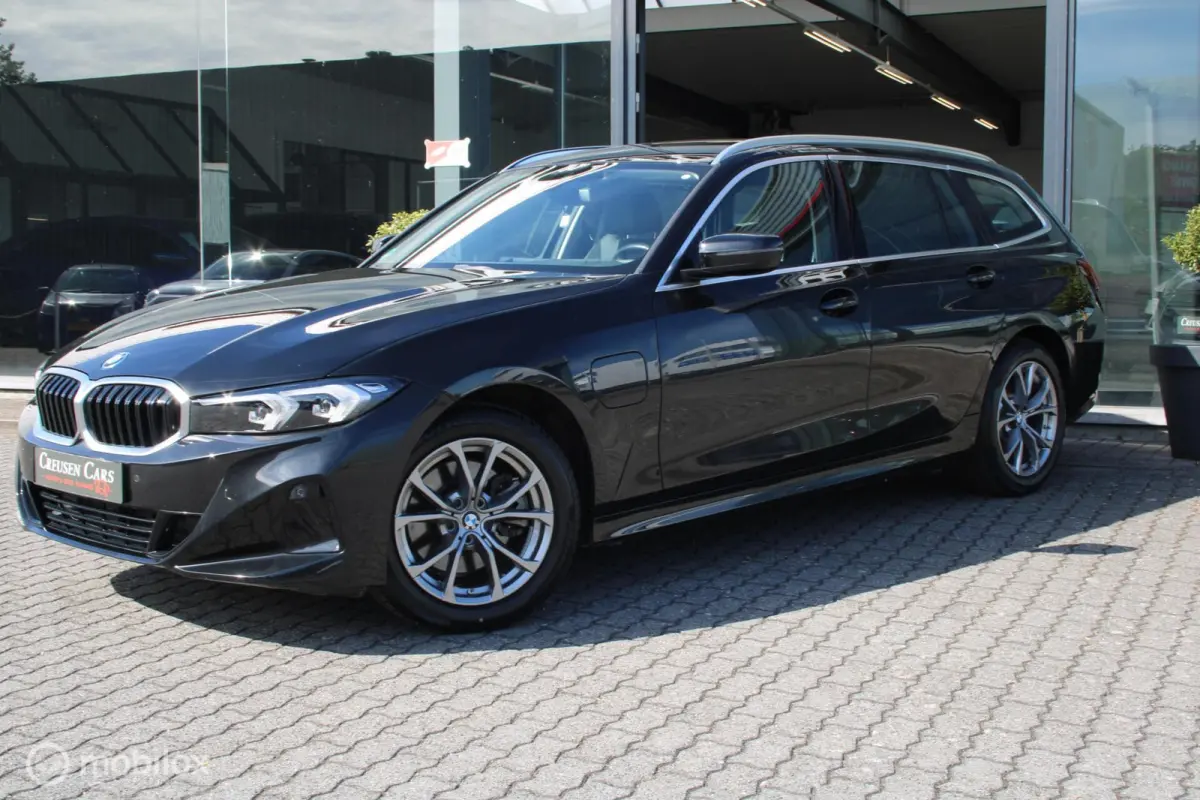 320e xDrive/Led/Trekhaak/Navi/Tel/All seas/