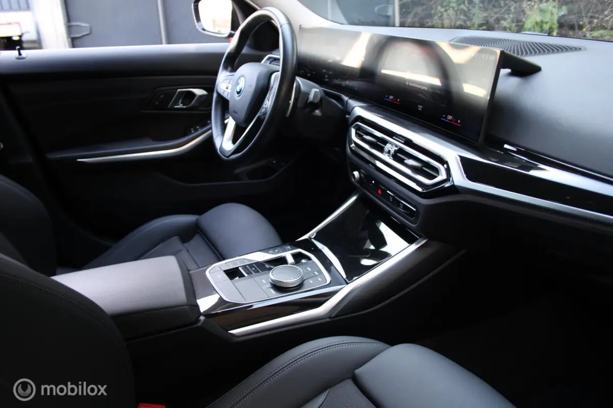 320e xDrive/Led/Trekhaak/Navi/Tel/All seas/