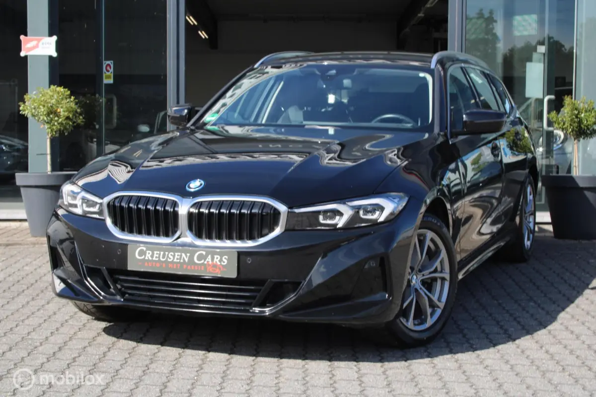 320e xDrive/Led/Trekhaak/Navi/Tel/All seas/