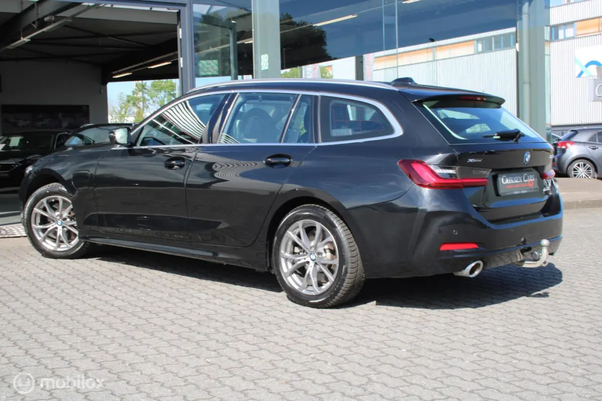 320e xDrive/Led/Trekhaak/Navi/Tel/All seas/