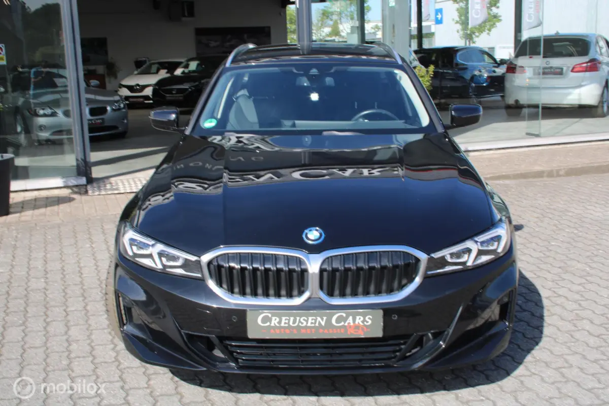 320e xDrive/Led/Trekhaak/Navi/Tel/All seas/