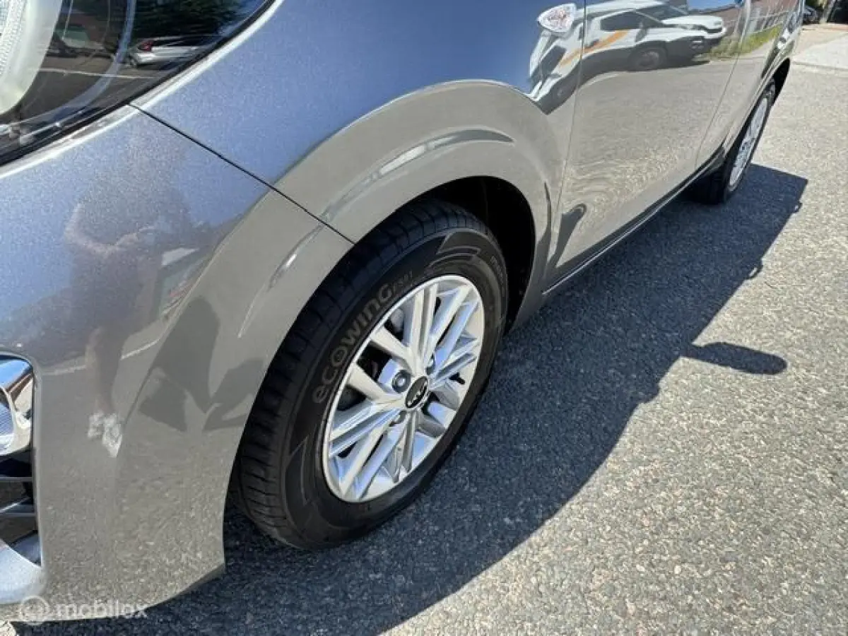 1.0 Dynamic Edition - Stoel & Stuurverwarming, Navigatie via Carplay, Camera achter, Airco, Electr - ramen en spiegels, Deurvergr. met afst.diening, Priveglas, Sport Velgen