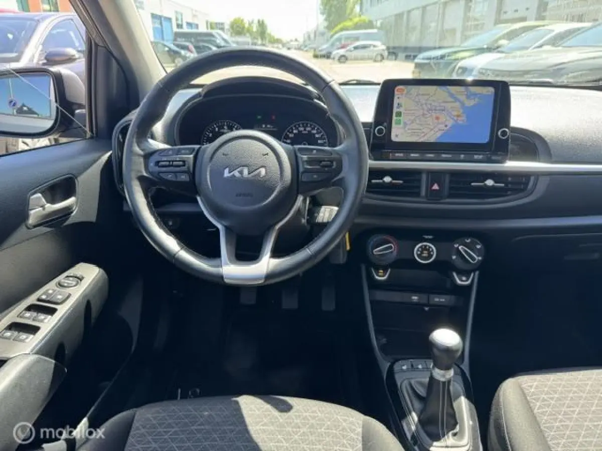 1.0 Dynamic Edition - Stoel & Stuurverwarming, Navigatie via Carplay, Camera achter, Airco, Electr - ramen en spiegels, Deurvergr. met afst.diening, Priveglas, Sport Velgen