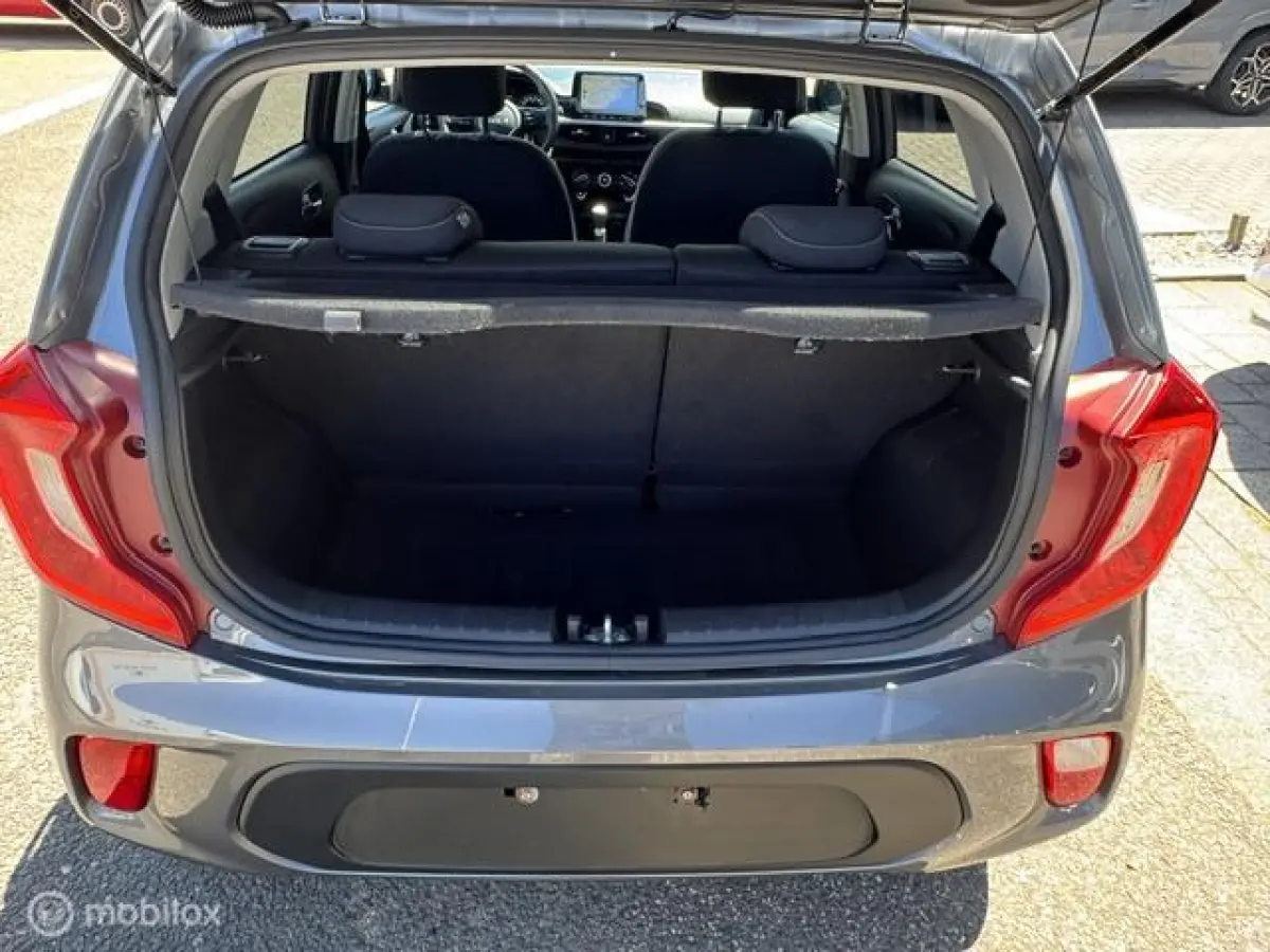 1.0 Dynamic Edition - Stoel & Stuurverwarming, Navigatie via Carplay, Camera achter, Airco, Electr - ramen en spiegels, Deurvergr. met afst.diening, Priveglas, Sport Velgen