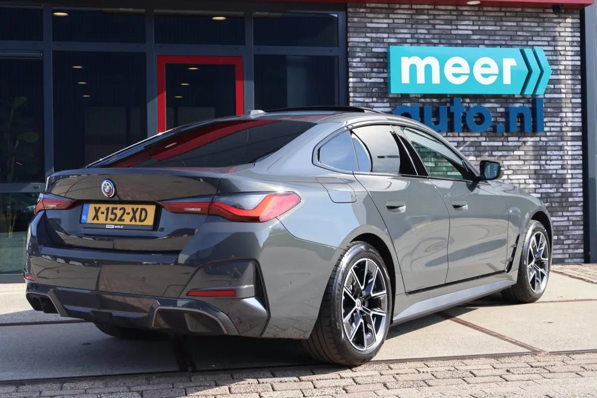 40 84 kWh High Executive M-SPORT l SOH 96,4% l H/K l HUD l 360 l SCHUIFDAK l DRAVITGRAU l SFEER l ORG.NL l 1e EIG l