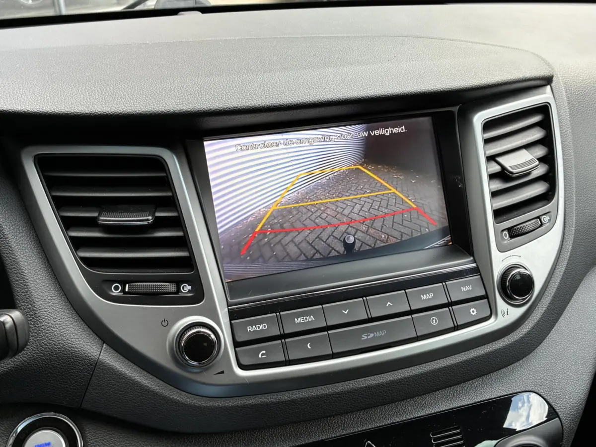 1.6 T-GDi Comfort 4WD Autom Led Cruise Leer Camera Navi Hoge Instap Perfecte Staat Eerste Eigenaar incl 12 maanden garantie