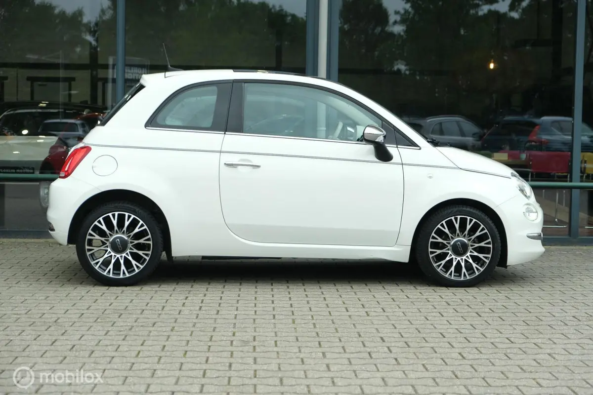 0.9 TwinAir Turbo Collezione | Pano | DAB+ | Two tone interior | LED | Nette auto | All Seasons