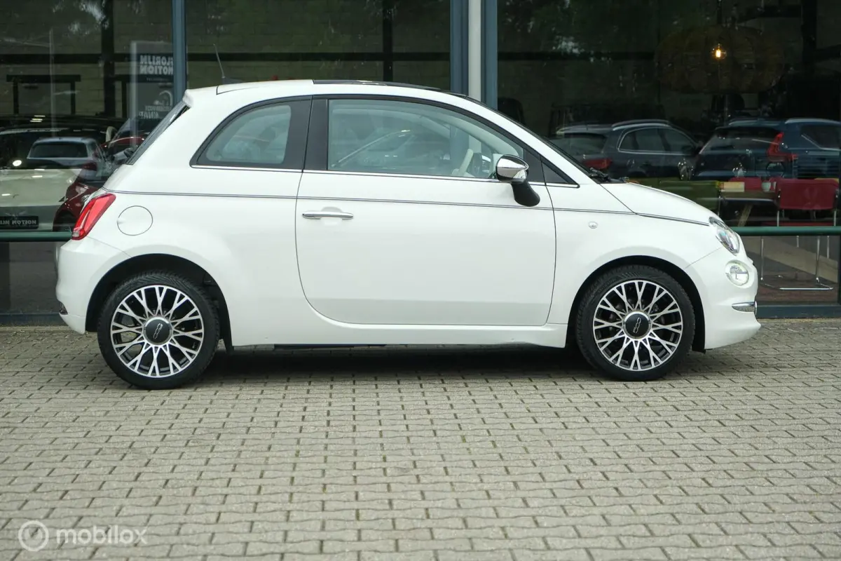 0.9 TwinAir Turbo Collezione | Pano | DAB+ | Two tone interior | LED | Nette auto | All Seasons