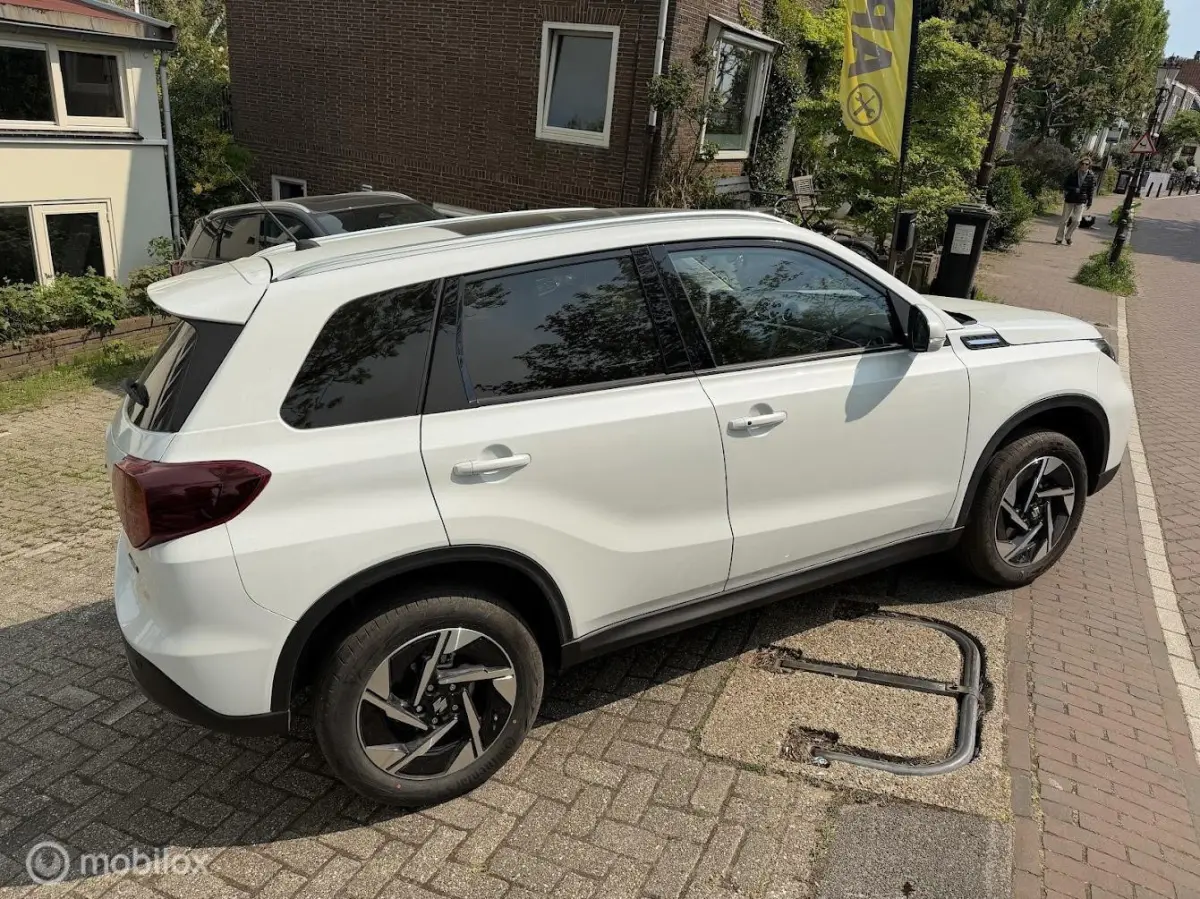 1.4 Boosterjet Hybrid Style Automaat, OPEN DAK