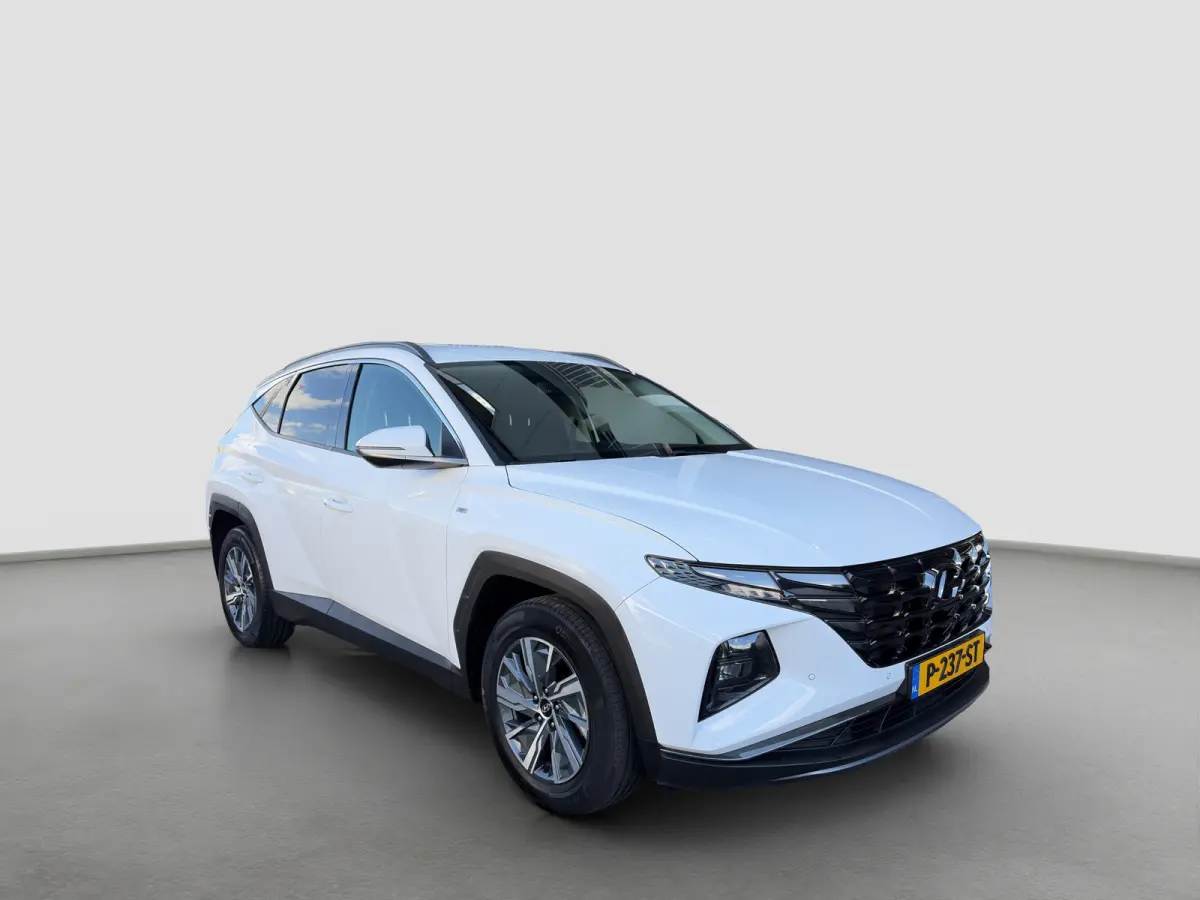 1.6 T-GDI 150pk MHEV Comfort Smart | Camera | Carplay | 19-inch Velgen | Navigatie | Stoel/Stuurverwarming | Elek. bed. achterklep | DAB | Draadloos telefoonlader | Premium Audio |