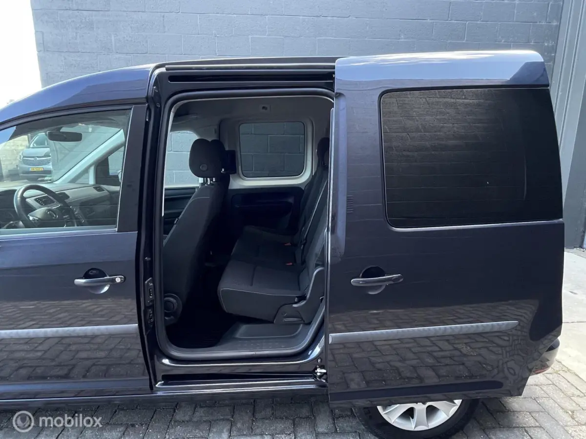 1.0 TSI | AIRCO | 2x Schuifdeur | All-season | Cruise | Stoelverwarming | Lage KM-stand |