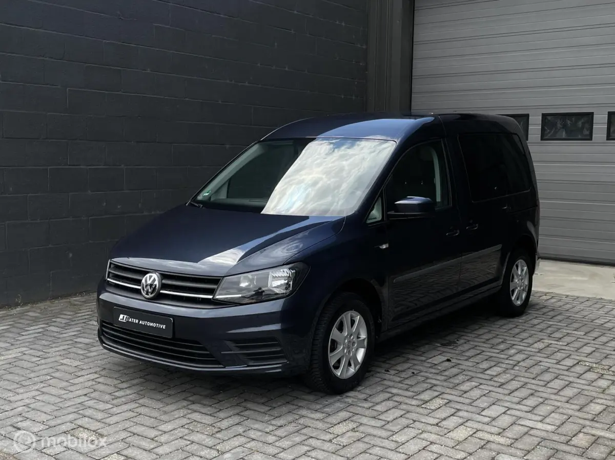 1.0 TSI | AIRCO | 2x Schuifdeur | All-season | Cruise | Stoelverwarming | Lage KM-stand |
