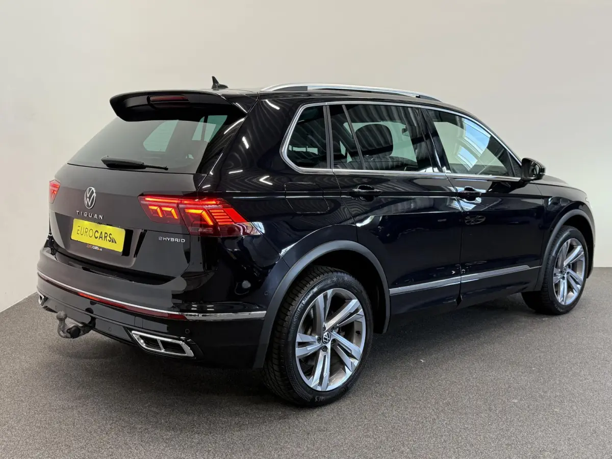 1.4 TSI eHybrid R-Line Business+ Automaat Trekhaak Panoramadak Navigatie IQ Light Stoel en Stuurverwarming Draadloze telefoonlader Digital Cockpit Climate Control Parkeersensoren 19 Inch
