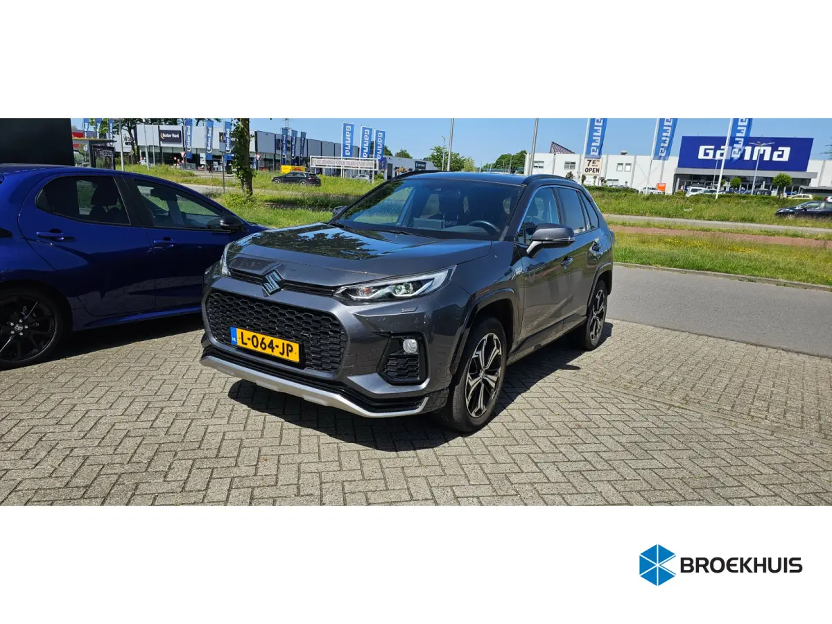 2.5 Plug-in Hybrid Style / Trekhaak / Navigatie / Camera / elektr. kofferklep / Dodehoek / Keyless / Stuur - en voor&achterstoelen verwarmd / Parkeersensoren