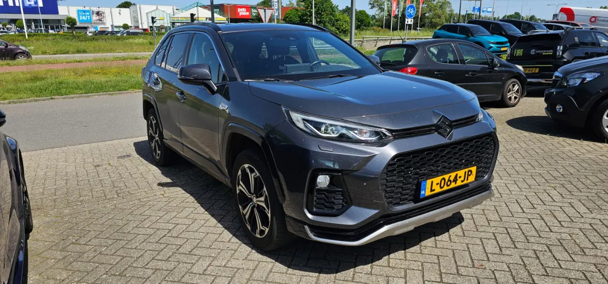 2.5 Plug-in Hybrid Style / Trekhaak / Navigatie / Camera / elektr. kofferklep / Dodehoek / Keyless / Stuur - en voor&achterstoelen verwarmd / Parkeersensoren