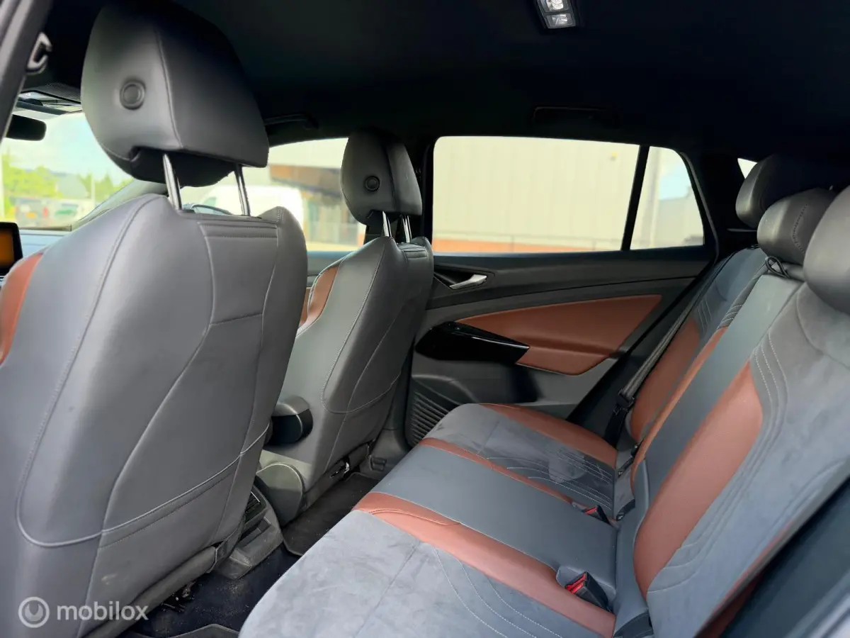 First 77 kWh |SOH89% | Trekhaak Af Fabriek | 20 Inch | Camera | Leder/Alcantara | Incl. BTW