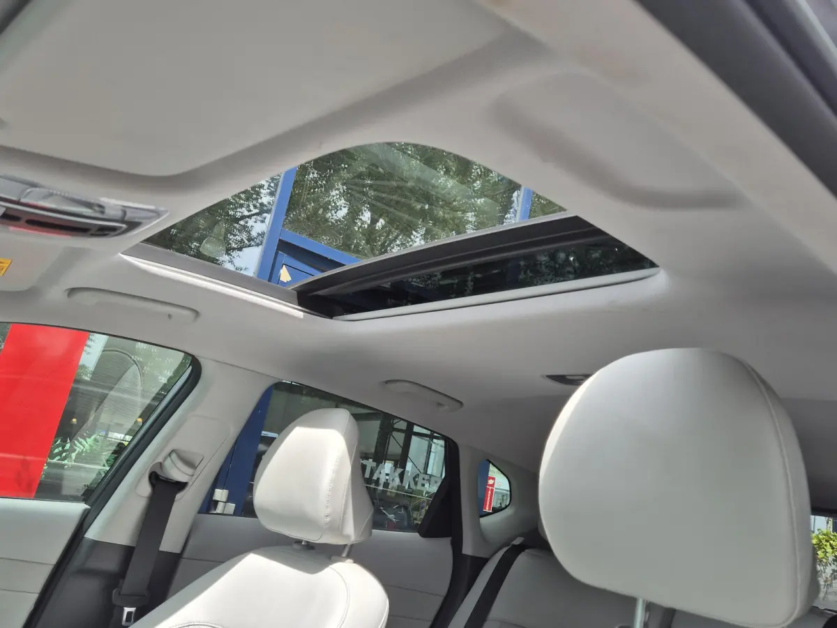 1.6 GDI HEV Premium Sky | Panoramadak | Navigatie | Leer | Cruise Control Licht metalen velgen