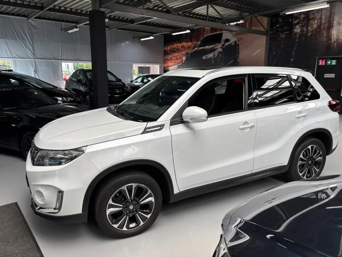 1.4 Boosterjet Style Smart Hybrid / Carplay / Panorama Dak