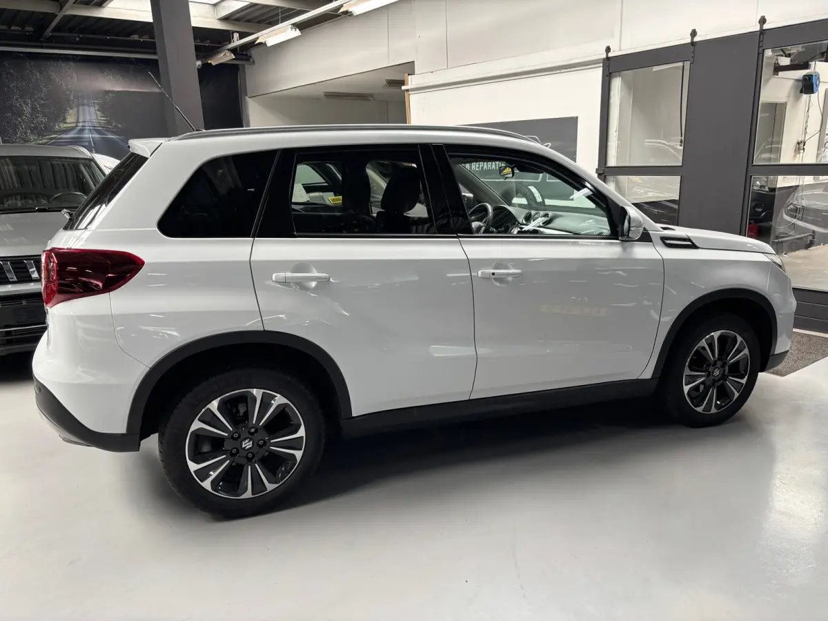 1.4 Boosterjet Style Smart Hybrid / Carplay / Panorama Dak
