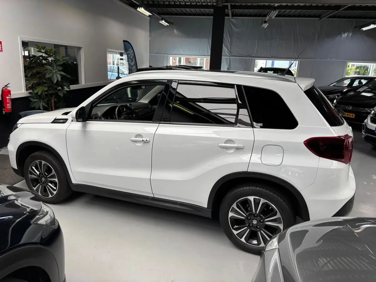 1.4 Boosterjet Style Smart Hybrid / Carplay / Panorama Dak