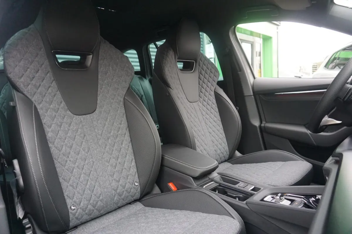 1.5 TSI 150pk DSG MHEV Sportline Tour | Canton Audio | Head-up | Trekhaak