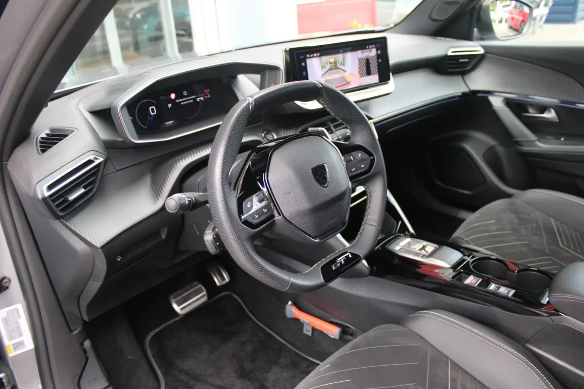 1.2 Hybrid 145PK AUTOMAAT GT PACK | ELEKTRISCH BEDIENBARE BESTUURDERSSTOEL | NAVIGATIE | FULL LED KOPLAMPEN | DRAADLOZE APPLE CARPLAY/ANDROID AUTO | ADAPTIVE CRUISE CONTROL | CAMERA VOOR + A