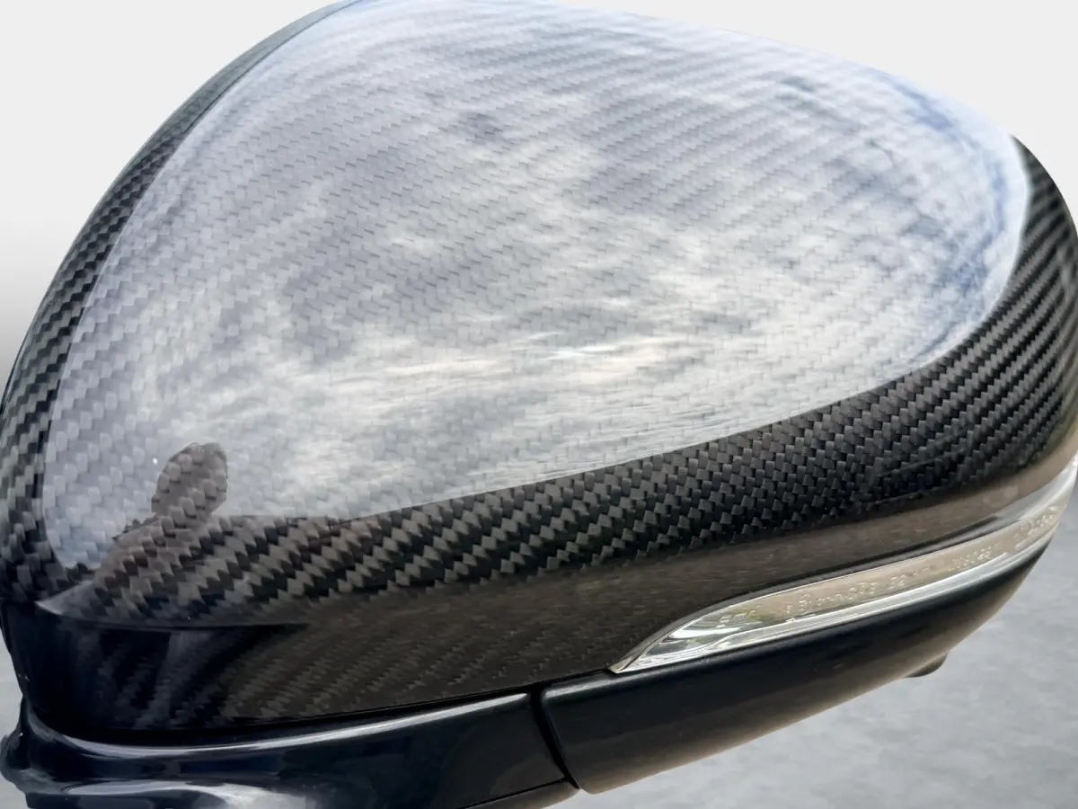 EV400 First Edition 90 kWh SOH 86,1% / NP ( € 111.500 ) / 22'' LMV ( € 2.542 ) / Carbon-Package / Luchtvering / MERIDIAN Sound / Duurste Uitvoering / Volledige Dealer Historie /