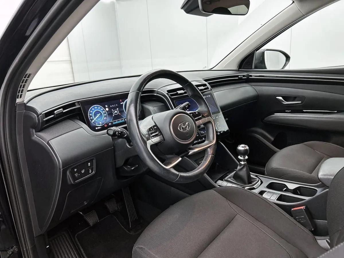 1.6 T-GDI MHEV Comfort Smart 150 PK | Navigatie | Airco | Stoelverwarming | Stuurverwarming | Achteruitrijcamera | Parkeersensoren | Trekhaak |