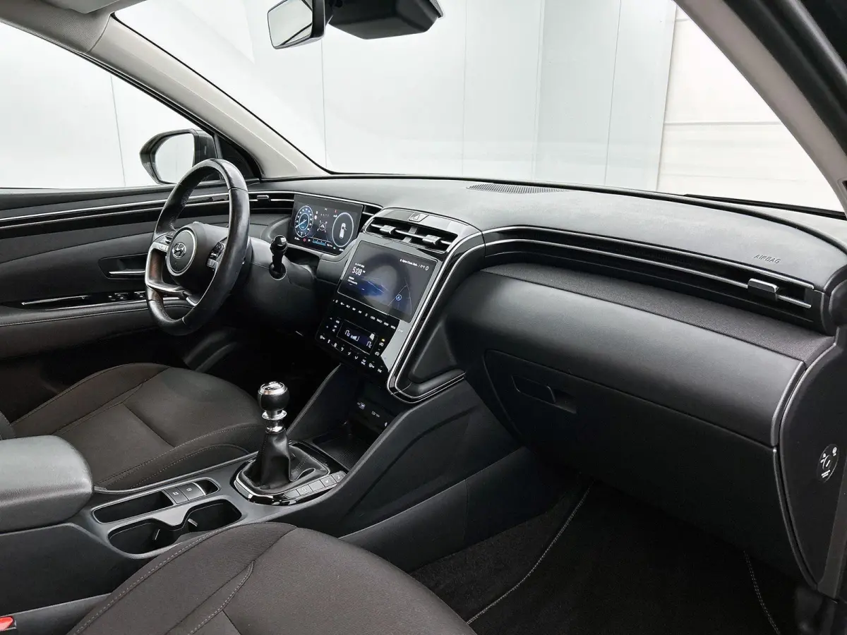 1.6 T-GDI MHEV Comfort Smart 150 PK | Navigatie | Airco | Stoelverwarming | Stuurverwarming | Achteruitrijcamera | Parkeersensoren | Trekhaak |