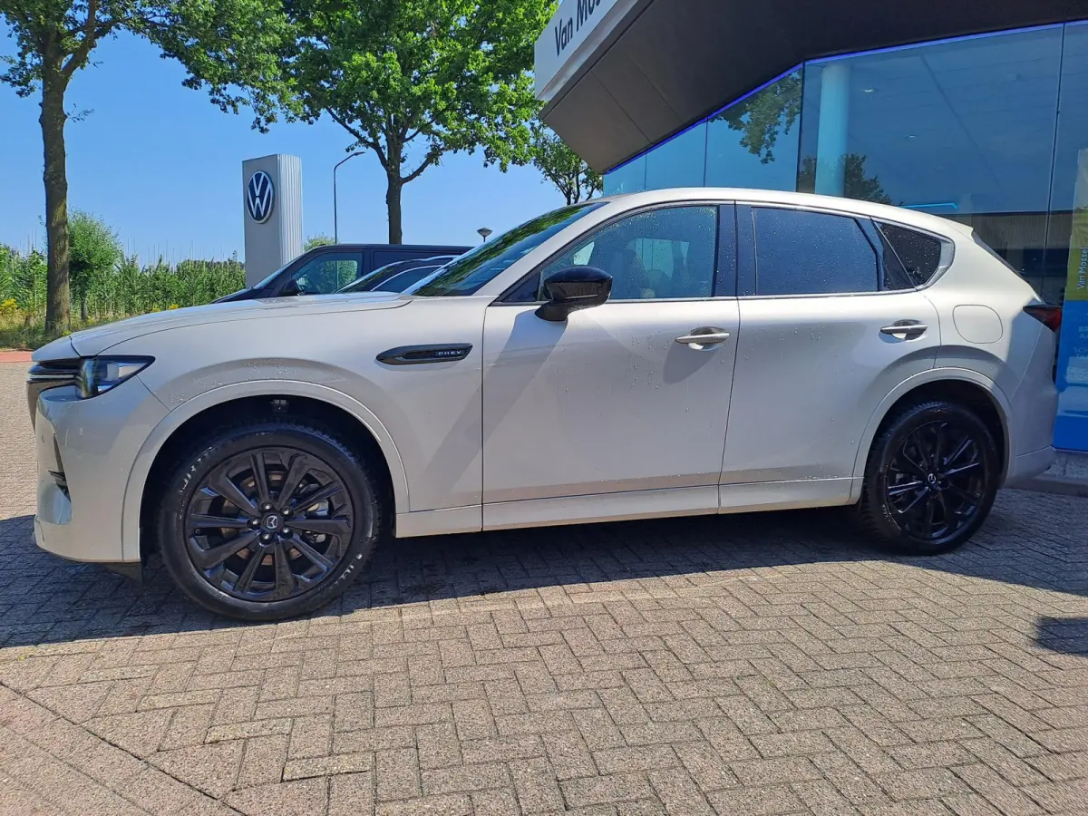 2.5 e-SkyActiv PHEV Homura Plus | SCHUIFDAK | TREKHAAK | LEER | 360 CAMERA | HEAD-UP | 20 INCH ZWARTE VELGEN | NAVIGATIE