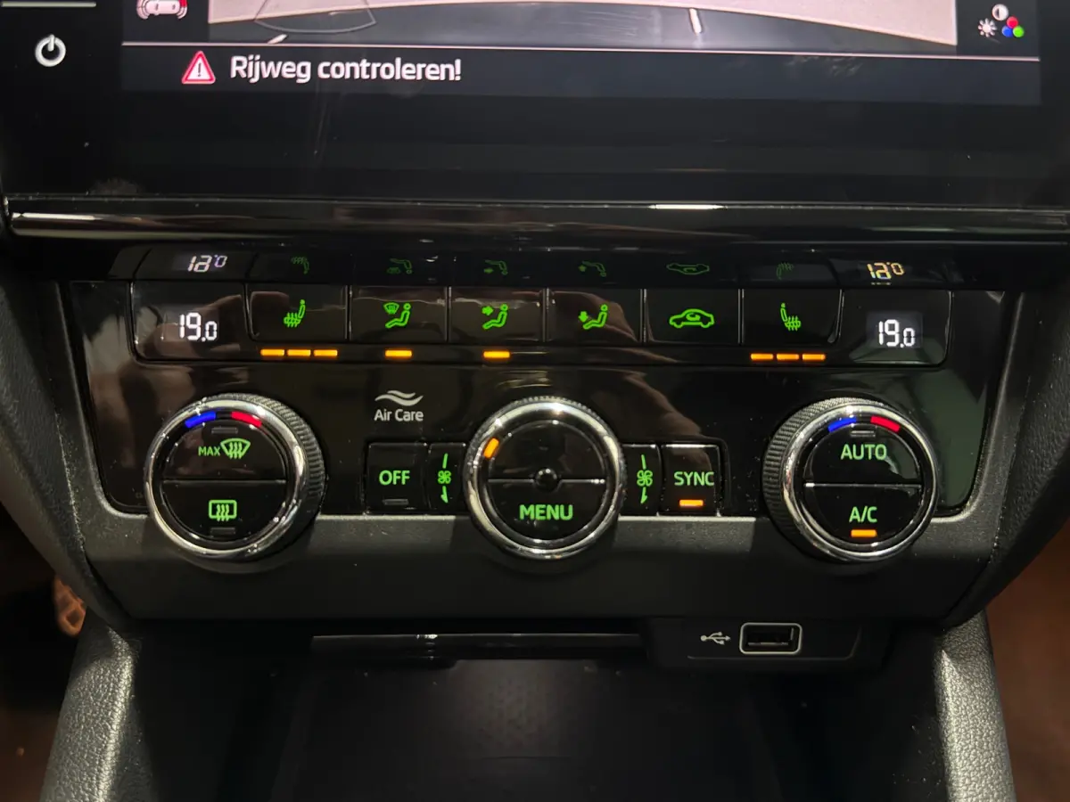 1.0 TSI Sportline Business | NAP | Keyless | Cruise Control | Stoelverwarming | Camera | Canton
