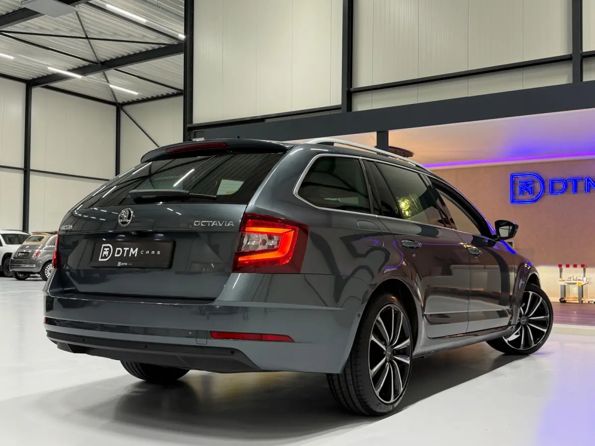 1.0 TSI Sportline Business | NAP | Keyless | Cruise Control | Stoelverwarming | Camera | Canton