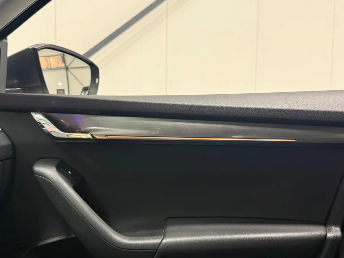 1.0 TSI Sportline Business | NAP | Keyless | Cruise Control | Stoelverwarming | Camera | Canton