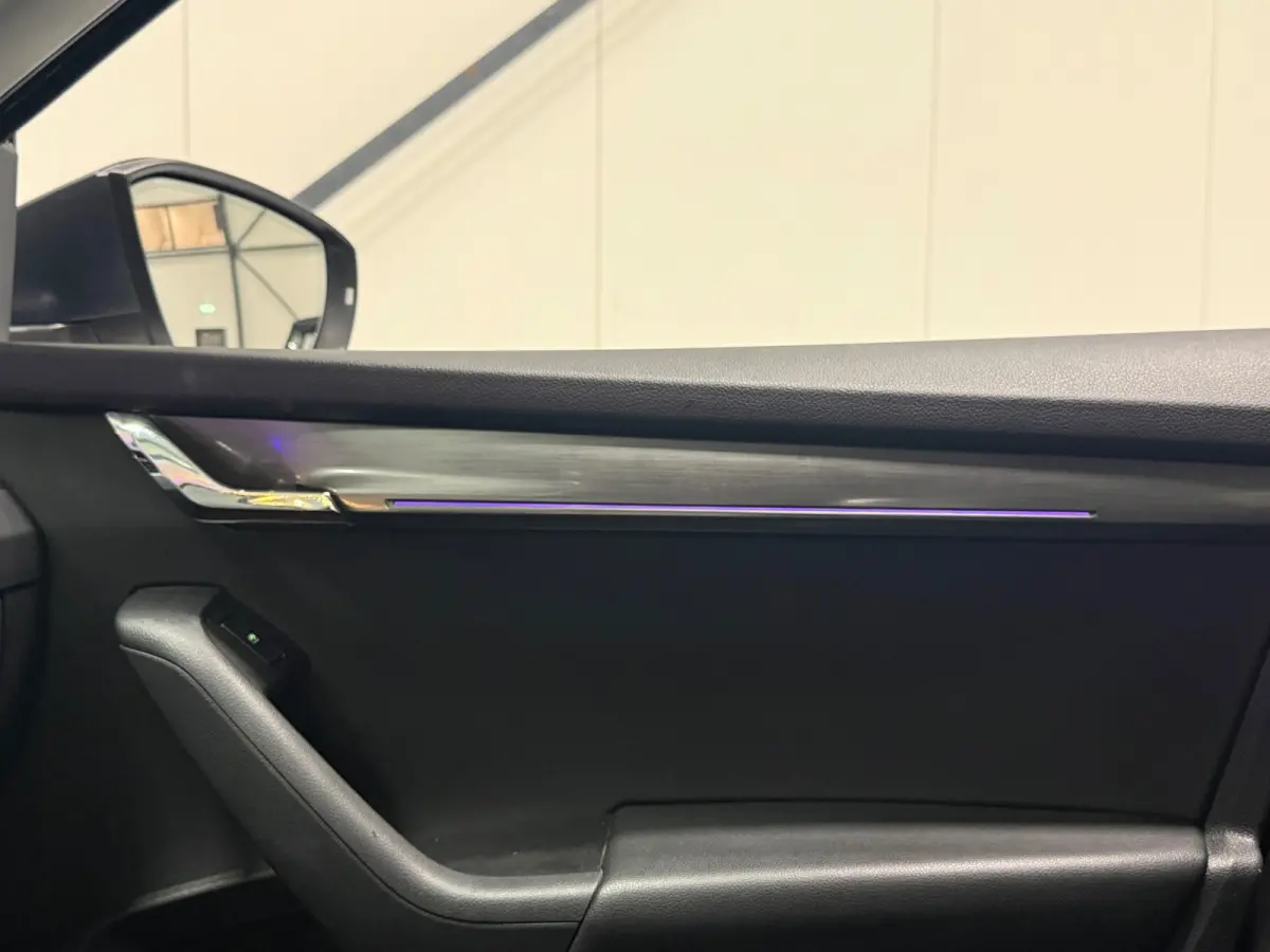 1.0 TSI Sportline Business | NAP | Keyless | Cruise Control | Stoelverwarming | Camera | Canton