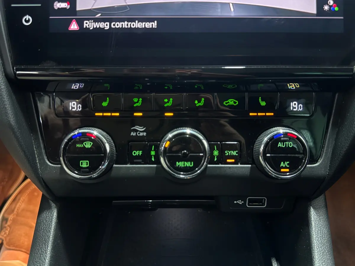 1.0 TSI Sportline Business | NAP | Keyless | Cruise Control | Stoelverwarming | Camera | Canton
