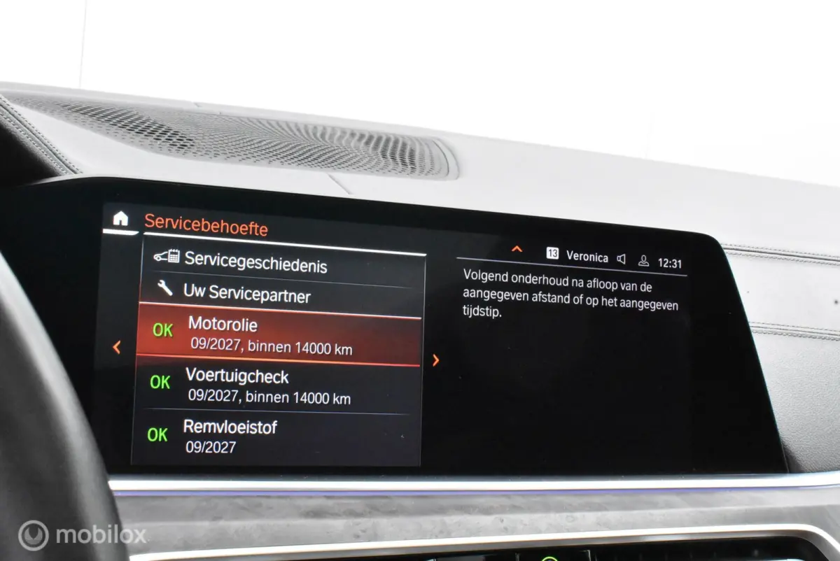 xDrive40i M-Performance Mineralweiß Pano Nappa HUD Softclose H/K Luchtvering 21" LMV Elek. trekhaak