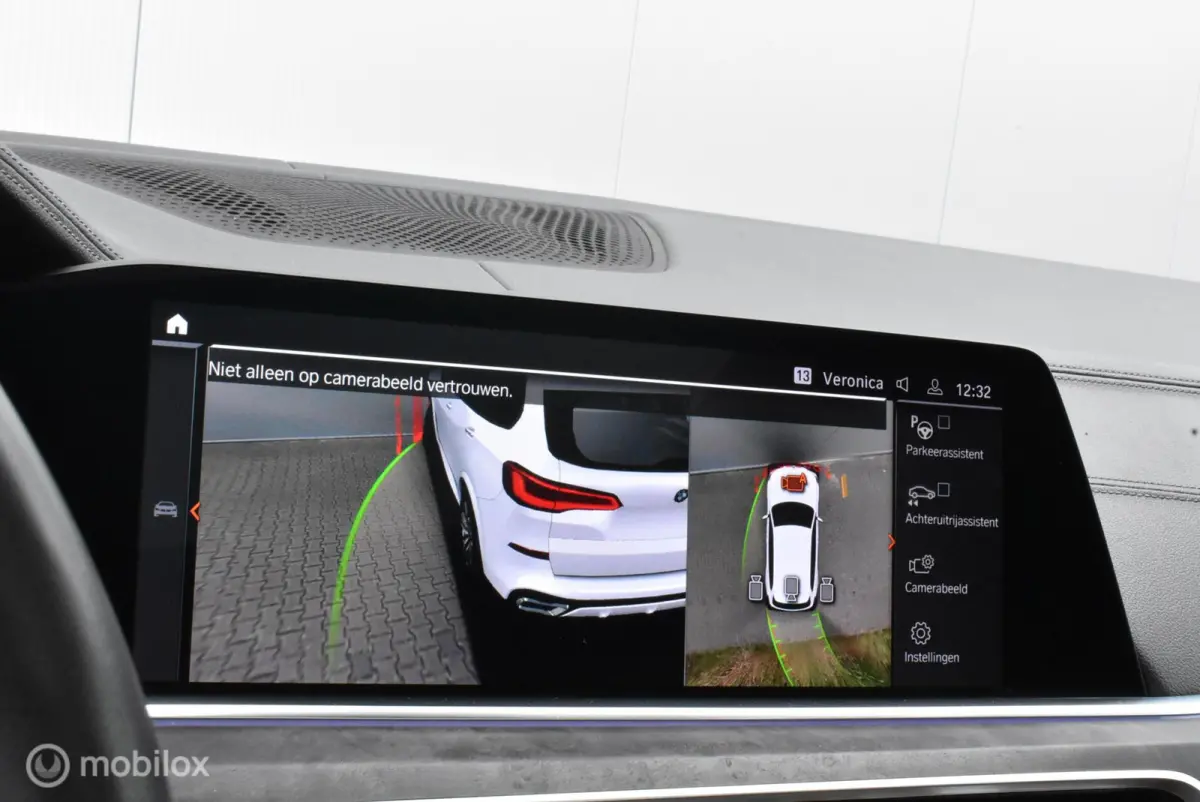 xDrive40i M-Performance Mineralweiß Pano Nappa HUD Softclose H/K Luchtvering 21" LMV Elek. trekhaak