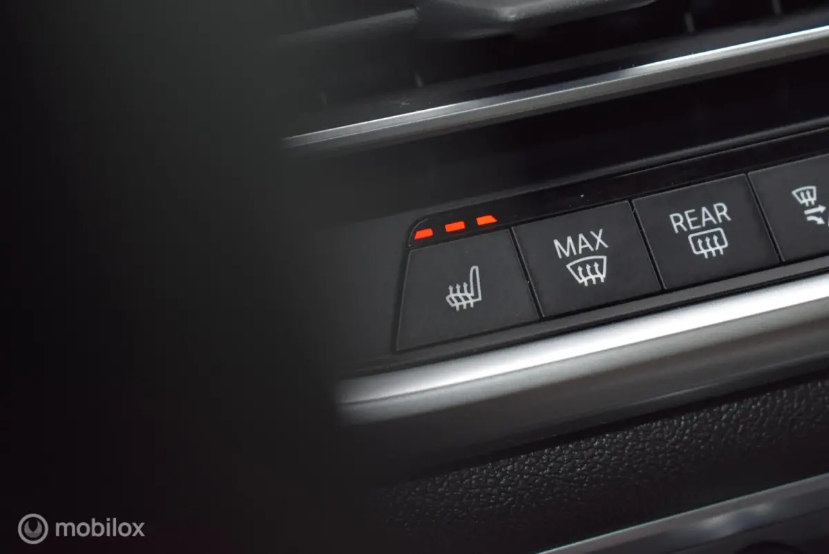 xDrive40i M-Performance Mineralweiß Pano Nappa HUD Softclose H/K Luchtvering 21" LMV Elek. trekhaak