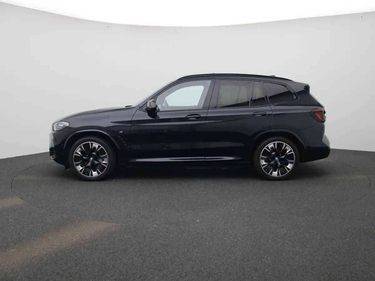 M-Sport 80 kWh | PANORAMADAK | 360 CAMERA | HARMAN KARDON | MEMORY | ELEKTRISCHE KOFFERKLEP | STOELVERWARMING | APPLE CARPLAY - ANDROID AUTO | LEDEREN STOELEN |