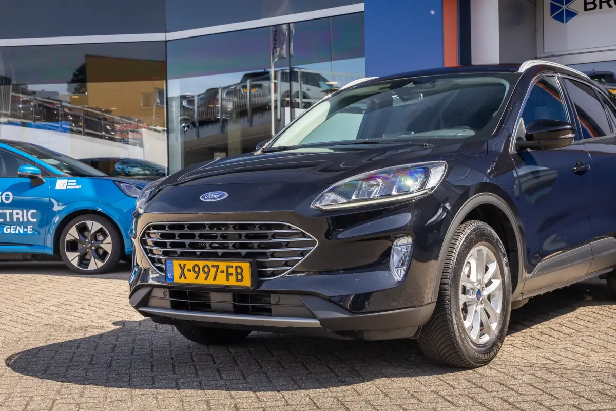 2.5 PHEV Titanium | Trekhaak | Keyless entry/Start | Achteruitrijcamera | Stoel/Stuurwiel Verwarming | Navigatiesysteem full map | Achteruitrijcamera | Airco (automatisch) | Keyless entry