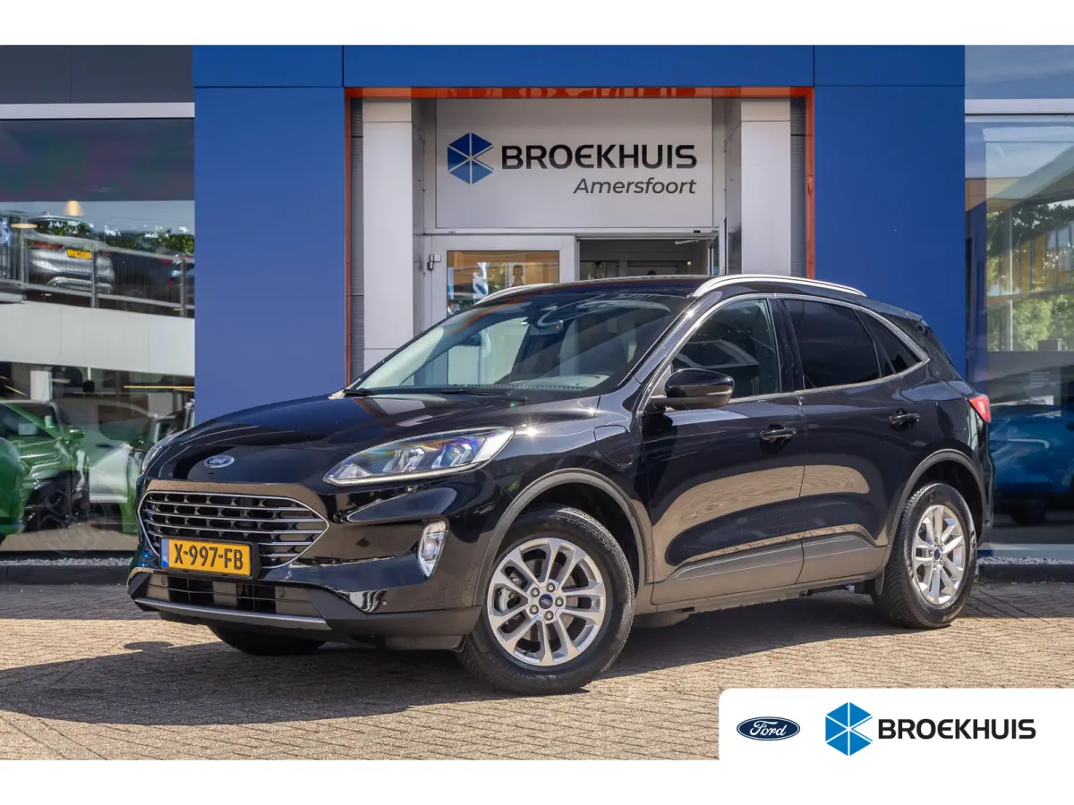 2.5 PHEV Titanium | Trekhaak | Keyless entry/Start | Achteruitrijcamera | Stoel/Stuurwiel Verwarming | Navigatiesysteem full map | Achteruitrijcamera | Airco (automatisch) | Keyless entry