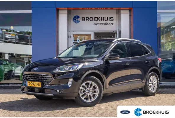 2.5 PHEV Titanium | Trekhaak | Keyless entry/Start | Achteruitrijcamera | Stoel/Stuurwiel Verwarming | Navigatiesysteem full map | Achteruitrijcamera | Airco (automatisch) | Keyless entry