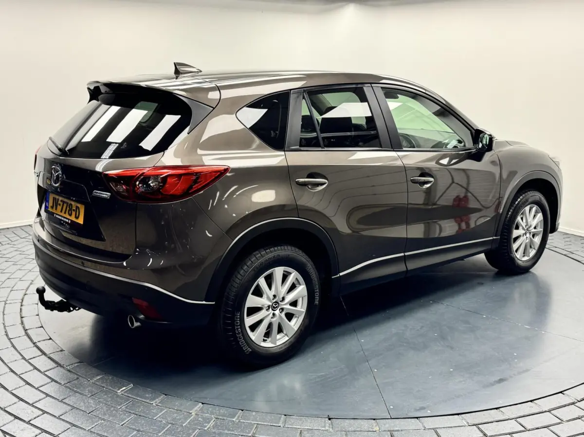 2.0i SkyActiv-G 165 2WD Automaat-Trekhaak-Navigatie-Cr.contr-Clima-Stoelverwarming-Parkeersensoren-Leder-Lm17''velgen
