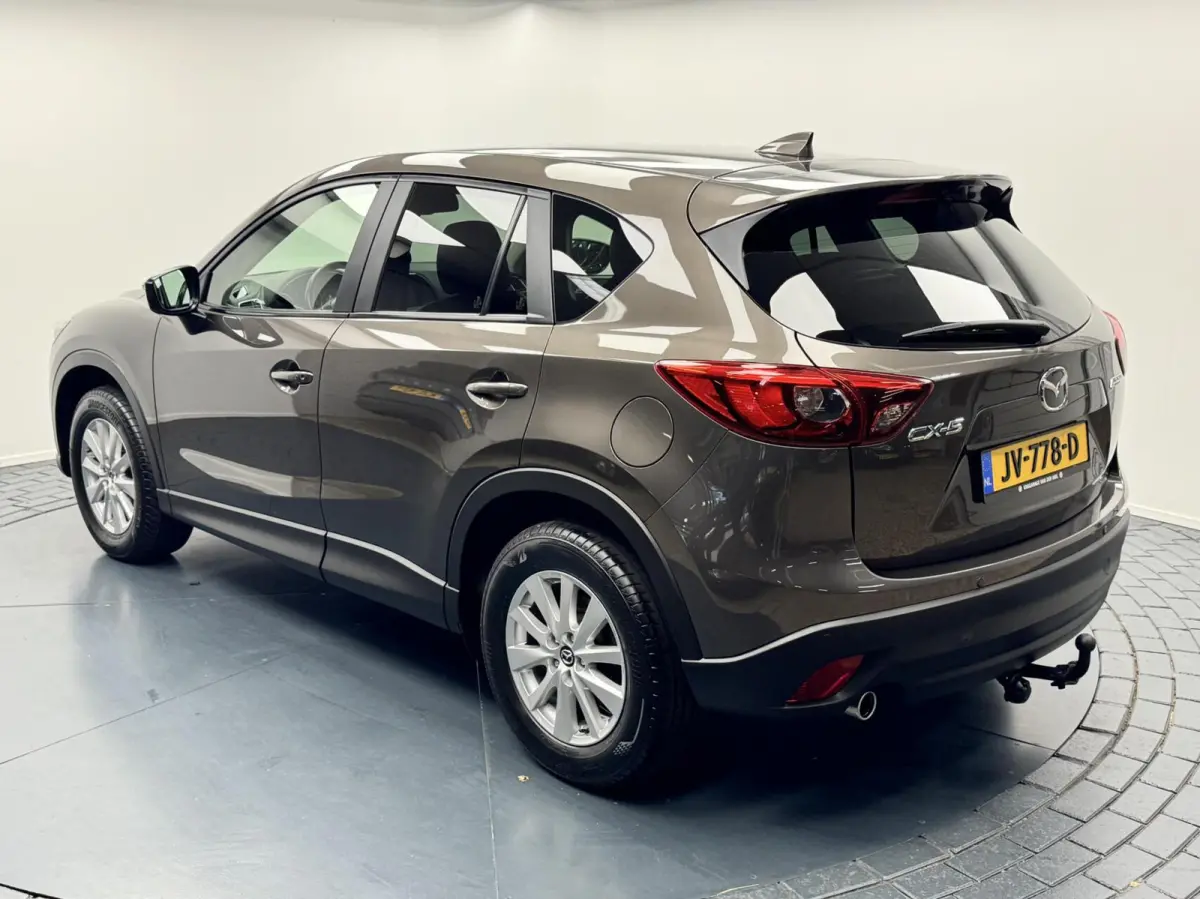 2.0i SkyActiv-G 165 2WD Automaat-Trekhaak-Navigatie-Cr.contr-Clima-Stoelverwarming-Parkeersensoren-Leder-Lm17''velgen