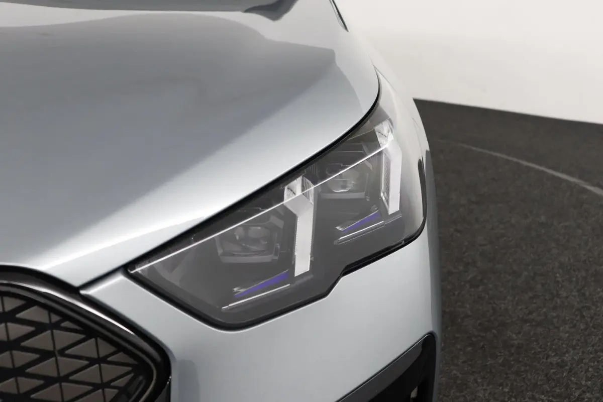 eDrive20 67 kWh M Sport Edition | SOH 100% | M Sport Pro | Trekhaak | Head-Up Display | Panoramadak | Elektrisch verstelbare stoelen | Driving Assistant Plus | Harman Kardon