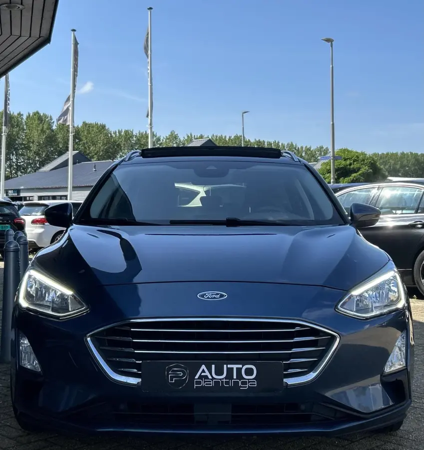 1.0 EcoBoost Titanium Business 125PK | PANO | 2e Eigenaar | NL AUTO | Onderhoudshistorie | NAP | Elektrische Achterklep | Parkeersensoren | Winter Pack | Stoel Stuur en Voorruitverwarming | 