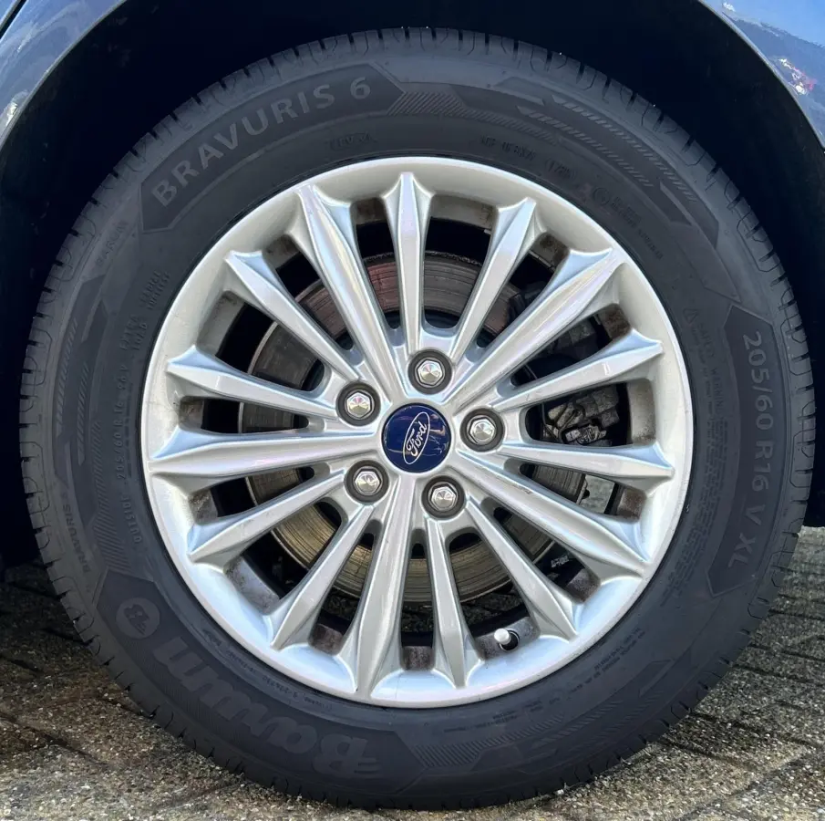 1.0 EcoBoost Titanium Business 125PK | PANO | 2e Eigenaar | NL AUTO | Onderhoudshistorie | NAP | Elektrische Achterklep | Parkeersensoren | Winter Pack | Stoel Stuur en Voorruitverwarming | 